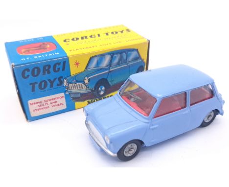 Corgi No.226 Morris Mini Minor - light Lilac blue, Red interior, spun hubs and cast spoked wheels. Condition appears Good in 