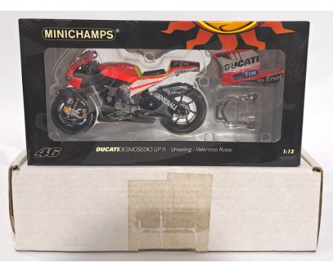 Minichamps 122110846 1/12 scale - "Valentino Rossi" Ducati Desmosedici GP11 - 2011 Unveiling. Conditions generally appear Nea