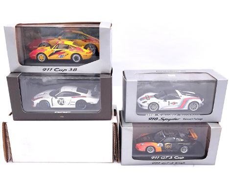 Minichamps (Paul's Model Art) a boxed group of 1/43 scale Porsche racing/sports models in various liveries to include WAP0201