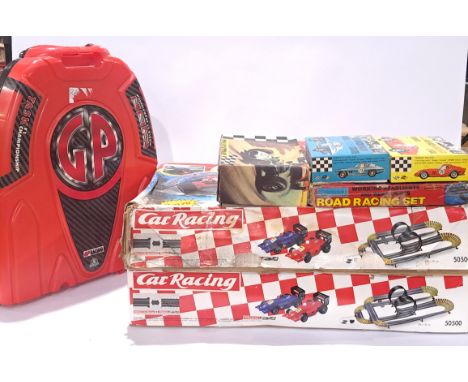 Scalextric, Revell and similar, a mixed group of Slot Cars and accessories, to include 2x boxes of "Car Racing 50500" (one se