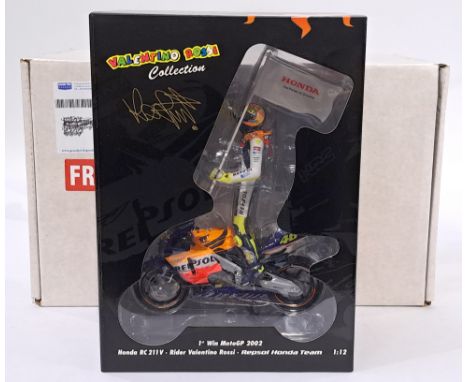 Minichamps 122037146 1/12 scale - "Valentino Rossi" Honda RC211V - Repsol Honda Team - 1st Win MotoGP. Conditions generally a