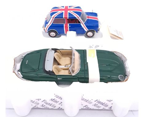 Franklin Mint, a boxed 1:24 scale pair comprising of B11TC05 1961 Jaguar in Green along with B11YF62 1967 Morris Mini Cooper 