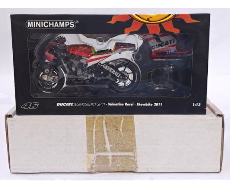 Minichamps 122100146 1/12 scale - "Valentino Rossi" - Ducati Desmosedici 2011 Showbike. Conditions generally appear Near Mint