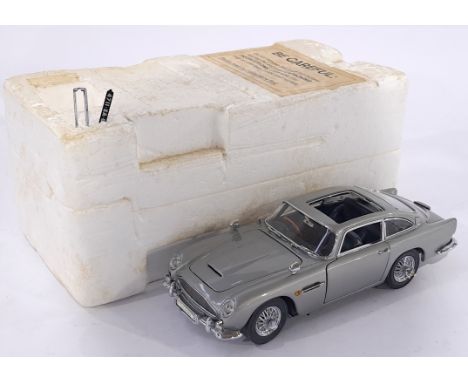 Danbury Mint a part boxed 1/24 scale James Bond 007 Aston Martin DB5 (Chrome). Conditions generally appear Good Plus in gener