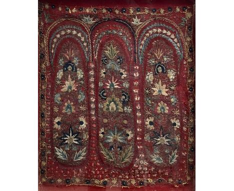 An Uzbek embroidered panel, with polychrome flowers and stylised plants, frame size 58.5 x 48.5cm.