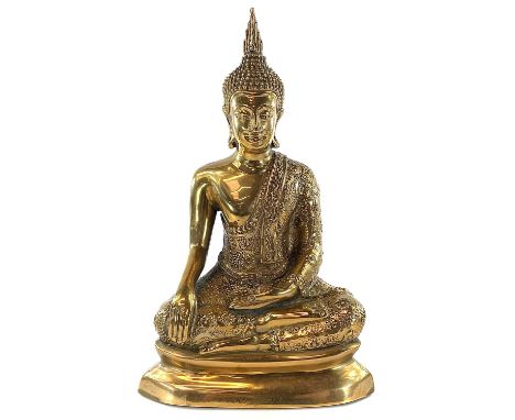 A bronze model of buddha, 20th century, with inscriptions to front and back, height 21cm, width 13cm, depth 8cm.