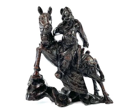 A Chinese carved wood figure of a warrior on horseback, 19th century, with silver wire inlay, height 35cm, width 30cm, depth 