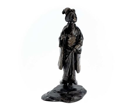 A Japanese bronze model of a Geisha, by Genryusai Seiya, Meiji Period, signed characters to the rear, wearing a gilt floral d