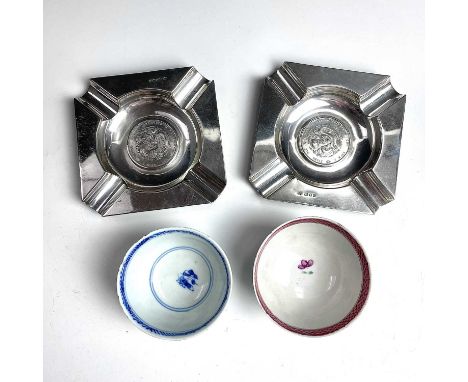 Two Chinese coins set within English silver ashtrays, with London hallmarks, coins inscribed '7 Mace and 2 Candareens Kiang N