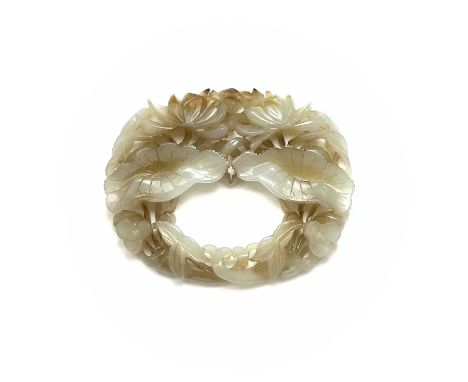 A Chinese oval jade carving of flowers and leaves, 6 x 7.5cm.Generally good condition.&nbsp;Extra images on our website www.d
