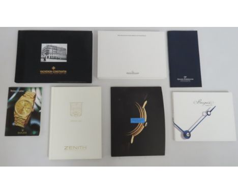 A selection of books related to premium watch brands including Rolex, Jaeger La-Coultre & Girard-Perregaux