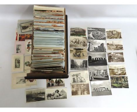 A drawer full of worldwide postcards including Plymouth post war rebuild, Stonehenge, New Zealand, Egypt & vintage greetings 