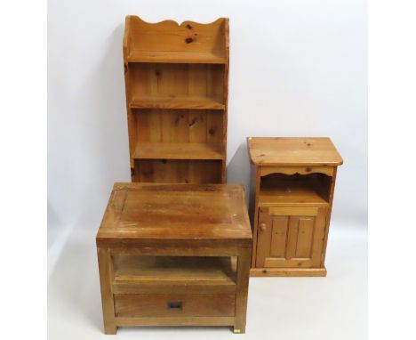 A pine book shelf, 1215mm tall x 457mm wide x 190mm at deepest, twinned with pine bedside cabinet & a small teak console tabl