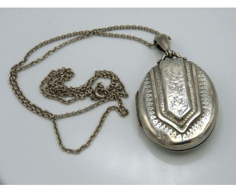An 1880 Victorian silver locket by Cornelius Desormeaux Saunders Sr & James Francis Hollings Shepard, slightly a/f, 16.8g