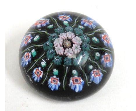 A vintage Strathearn glass paperweight, 65mm diameter
