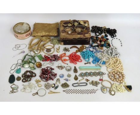 A selection of costume jewellery items including wristwatches, kilt pin, malachite pendant, fashion necklaces & other items