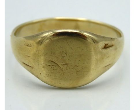 An antique yellow metal signet ring, tests electronically as 9ct gold, 6g