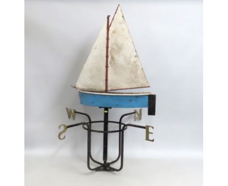 A large vintage weather vane depicting a sailboat, 1320mm tall