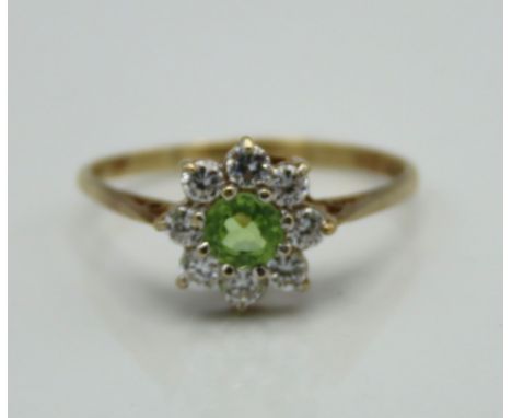A 9ct gold ring set with green & white stones, 1.4g, size N/O