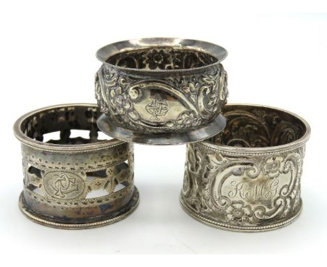 Three serviette rings, two Birmingham silver 1894 & 1921, the other 19thC. white metal dating to c. 1897, 83.3g total