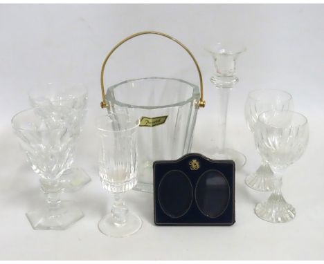 A Baccarat crystal ice bucket, a pair of Baccarat red wine glasses, a pair of Bacarrat white wine glasses, one cracked twinne