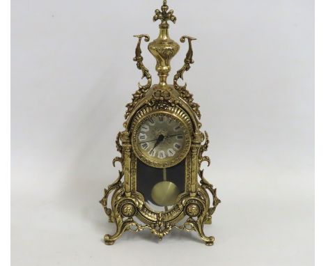 A reproduction French style brass quartz mantle clock, 400mm tall 