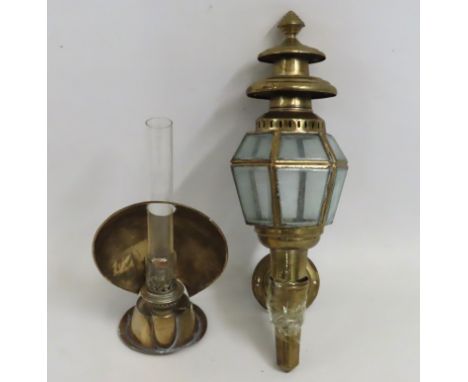 A brass coaching style lamp twinned with a smaller paraffin lamp, tallest 410mm