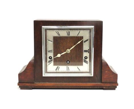An art deco oak mantle clock, 310mm wide x 215mm high x 112mm deep