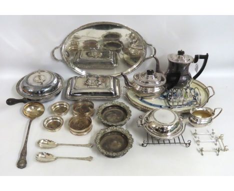 A 19thC. silver plated two handled tray, 550mm wide x 343mm deep, a large kings pattern silver plated ladle, a silver plated 