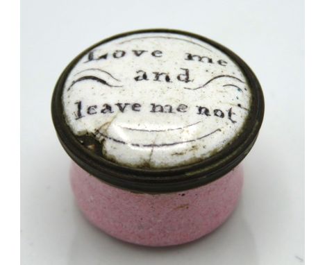 An 18thC. Georgian enamel patch box with motto 'Love me & leave me not', 22mm diameter