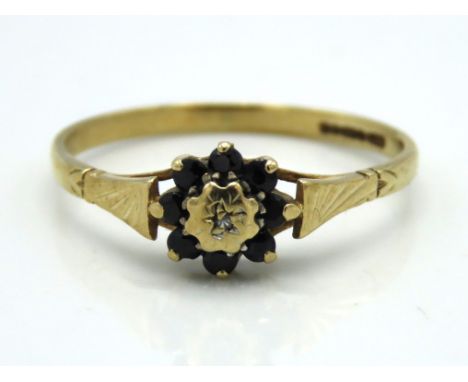 A 9ct gold ring set with diamond & sapphire, 1.5g, size Q