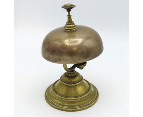 A vintage W. T. & S brass reception bell, 130mm tall