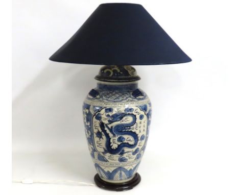An impressive large Chinese style lamp with dragon decor, 840mm tall overall