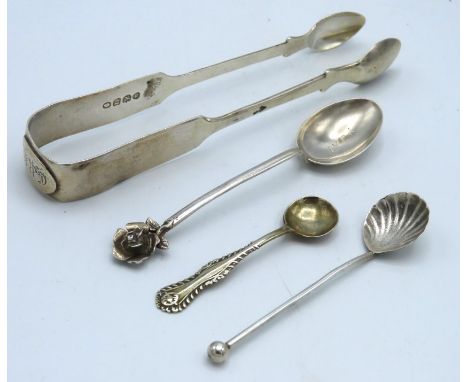 An 1828 George IV London silver pair of sugar tongs by David Phillips twinned with a silver spoon with floral finial & two si