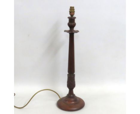 A decorative carved wooden lamp base with fluted stem above acanthus leaves & scalloped collar, 620mm tall