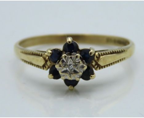 A 9ct gold ring set with sapphire & diamond, size O/P, 1.4g