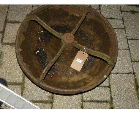 A cast iron circular four division livestock feeding trough, dia. 56cmDamaged to rim.Missing divisions.