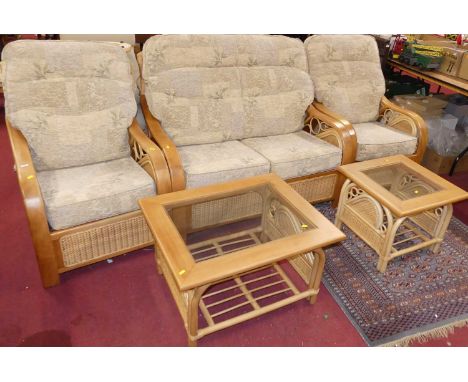 A contemporary five piece formed laminate and wicker conservatory suite, comprising; two seater sofa, pair of armchairs, and 