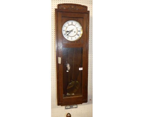 A circa 1920s Gustav Becker laboratory eight-day regulator drop trunk wall clock, having white enamel Roman dial, twin weight