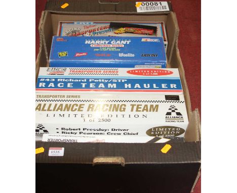 One tray of 1/64 scale Nascar related tractor units and trailers to include Richard Petty's Race Team Hauler