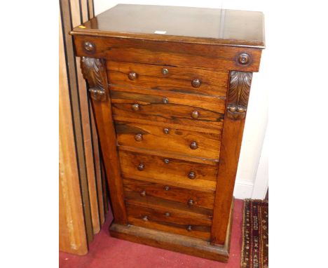 A mid-Victorian rosewood Wellington chest, having bank of six graduated drawers with acanthus leaf capping, width 60.5cmNo ke