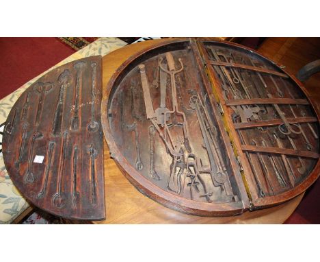 A Persian painted wood and brass bound demi-lune portable tool box, enclosing sundry hand tools, the exterior bright colour d