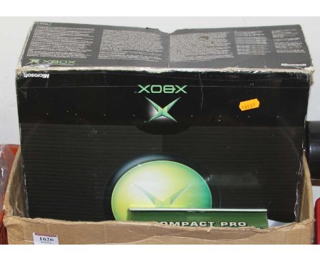 An original Xbox  by Microsoft gaming console and a Compact Pro control unit, Corgi plastic carry case with a quantity of die