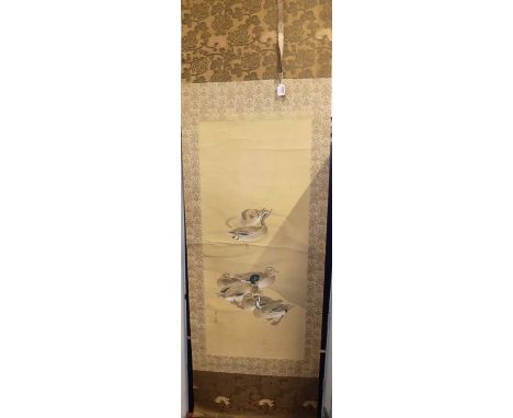 A Chinese scroll painted in gouche with ducks, signed and with studio seal, 115 x 49cm, all within a silkwork border 