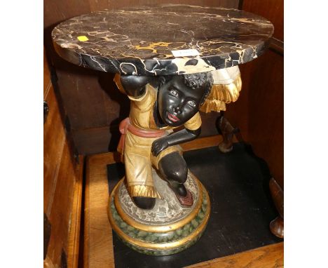 A low occasional table with decorative carved and polychrome painted wood figure of a kneeling Blackamoor, with veined marble
