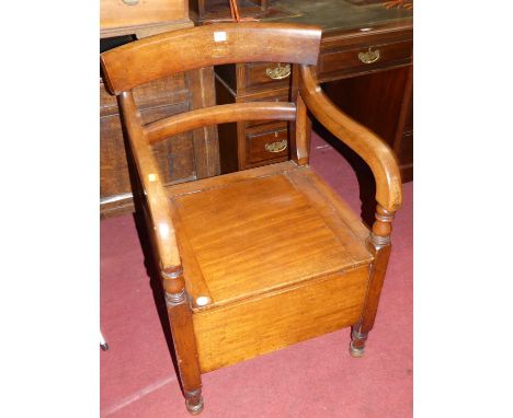 A Victorian mahogany hinge top commode elbow chair, width 55cm