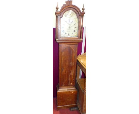 An early 19th century provincial oak long case clock, the arched and painted dial signed T Bowra, Epsom, with subsidiary seco