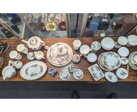 Wedgwood 'Hathaway Rose' Tea Service, comprising teapot, 3 x milk jugs, 2 x sugar bowls, 11 cups, 11 saucers, 11 side plates,