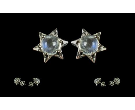 Rainbow Moonstone Star Stud Earrings, a round cut cabochon moonstone, with all the flashes of inner blue light expected of ra