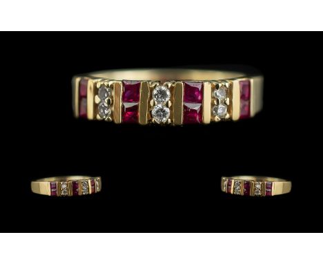 Ladies 14ct Gold Attractive Contemporary Designed Ruby &amp; Diamond Set Dress Ring, marked 14ct to shank.  Rubies and diamon